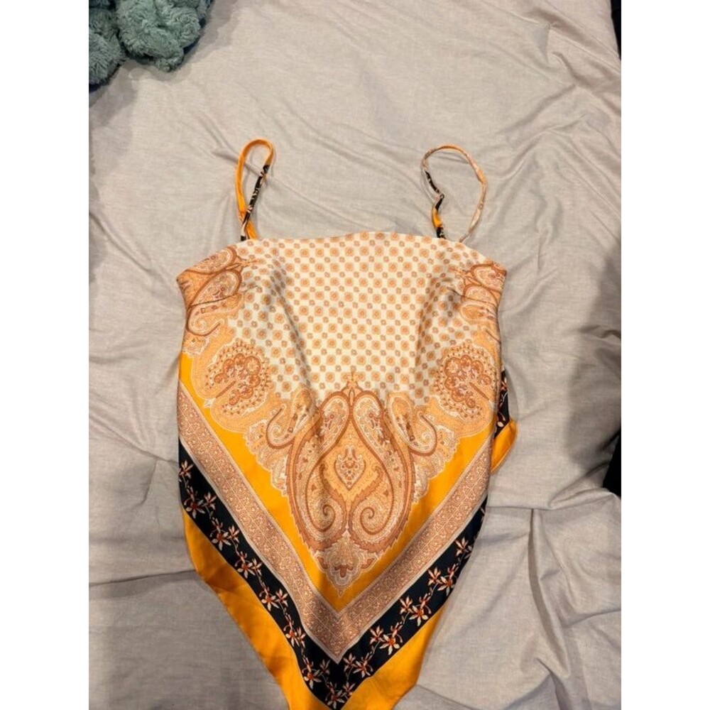 Tiny top